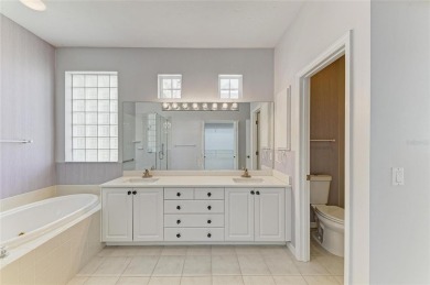 One or more photo(s) has been virtually staged. DARLING HOME! on IMG Academies Golf and Country Club in Florida - for sale on GolfHomes.com, golf home, golf lot
