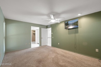 Location, location! This charming 3-bedroom, 2.5-bath home in on PalmBrook Country Club in Arizona - for sale on GolfHomes.com, golf home, golf lot