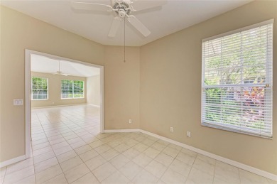 One or more photo(s) has been virtually staged. DARLING HOME! on IMG Academies Golf and Country Club in Florida - for sale on GolfHomes.com, golf home, golf lot