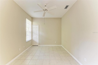 One or more photo(s) has been virtually staged. DARLING HOME! on IMG Academies Golf and Country Club in Florida - for sale on GolfHomes.com, golf home, golf lot