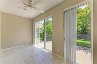 One or more photo(s) has been virtually staged. DARLING HOME! on IMG Academies Golf and Country Club in Florida - for sale on GolfHomes.com, golf home, golf lot