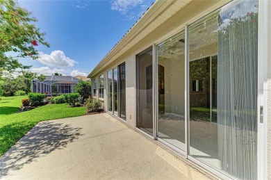 One or more photo(s) has been virtually staged. DARLING HOME! on IMG Academies Golf and Country Club in Florida - for sale on GolfHomes.com, golf home, golf lot