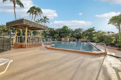 Stunning golf course and pond views from a light-filled corner on Seminole Lake Country Club in Florida - for sale on GolfHomes.com, golf home, golf lot