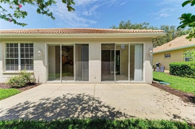 One or more photo(s) has been virtually staged. DARLING HOME! on IMG Academies Golf and Country Club in Florida - for sale on GolfHomes.com, golf home, golf lot