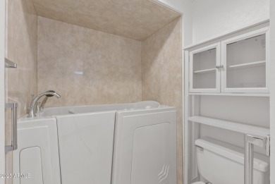 Location, location! Updated flooring (10/25) This 2118 sq ft on PalmBrook Country Club in Arizona - for sale on GolfHomes.com, golf home, golf lot