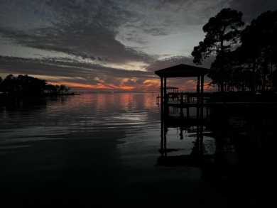 Claim your piece of paradise with this spectacular WATERFRONT on Bluewater Bay Resort in Florida - for sale on GolfHomes.com, golf home, golf lot