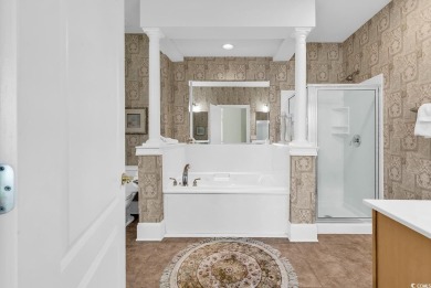 This top-floor, 4 bedroom, 3 bath condo in Edgewater at Barefoot on Barefoot Resort and Golf Club  in South Carolina - for sale on GolfHomes.com, golf home, golf lot
