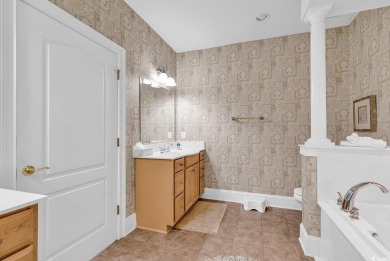 This top-floor, 4 bedroom, 3 bath condo in Edgewater at Barefoot on Barefoot Resort and Golf Club  in South Carolina - for sale on GolfHomes.com, golf home, golf lot