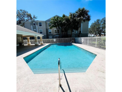 Step into the realm of luxurious living at Golf Ridge Condo on MetroWest Golf Club in Florida - for sale on GolfHomes.com, golf home, golf lot