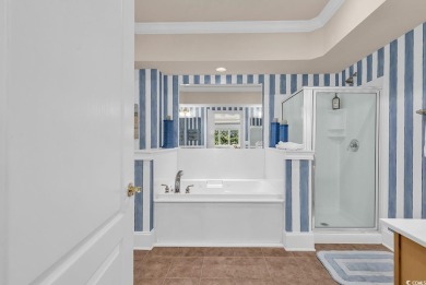 This top-floor, 4 bedroom, 3 bath condo in Edgewater at Barefoot on Barefoot Resort and Golf Club  in South Carolina - for sale on GolfHomes.com, golf home, golf lot