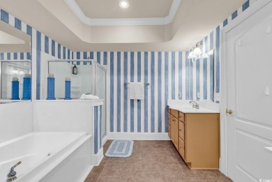 This top-floor, 4 bedroom, 3 bath condo in Edgewater at Barefoot on Barefoot Resort and Golf Club  in South Carolina - for sale on GolfHomes.com, golf home, golf lot
