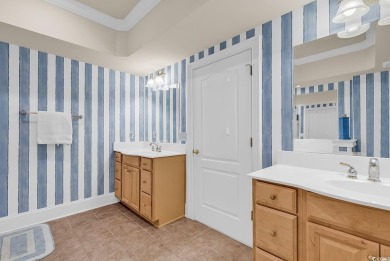 This top-floor, 4 bedroom, 3 bath condo in Edgewater at Barefoot on Barefoot Resort and Golf Club  in South Carolina - for sale on GolfHomes.com, golf home, golf lot