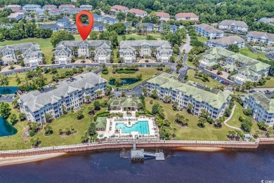 This top-floor, 4 bedroom, 3 bath condo in Edgewater at Barefoot on Barefoot Resort and Golf Club  in South Carolina - for sale on GolfHomes.com, golf home, golf lot