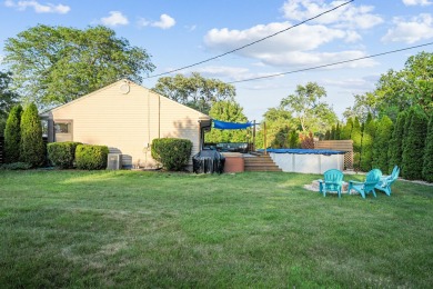 Stunning Stone and Cedar Ranch on a huge corner lot in desirable on White Pines Golf Course in Illinois - for sale on GolfHomes.com, golf home, golf lot