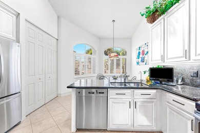 Welcome to this well maintained 2nd floor 2500 sq ft condo in on BallenIsles Golf and Country Club in Florida - for sale on GolfHomes.com, golf home, golf lot