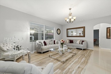 Picture mornings by your sparkling pool, coffee in hand on Wedgefield Golf Club in Florida - for sale on GolfHomes.com, golf home, golf lot