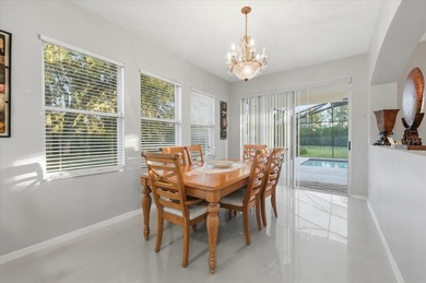 Picture mornings by your sparkling pool, coffee in hand on Wedgefield Golf Club in Florida - for sale on GolfHomes.com, golf home, golf lot