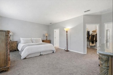 Picture mornings by your sparkling pool, coffee in hand on Wedgefield Golf Club in Florida - for sale on GolfHomes.com, golf home, golf lot