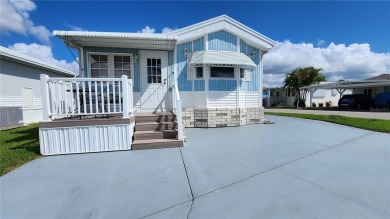 CHEERFUL HOME IN ACTIVE 55+ COMMUNITY! This one bed, two bath on River Run Golf Links in Florida - for sale on GolfHomes.com, golf home, golf lot