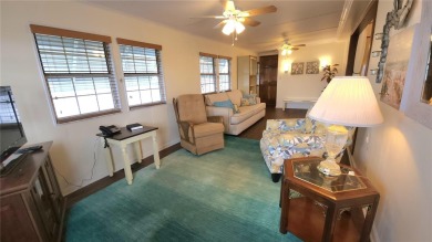 CHEERFUL HOME IN ACTIVE 55+ COMMUNITY! This one bed, two bath on River Run Golf Links in Florida - for sale on GolfHomes.com, golf home, golf lot