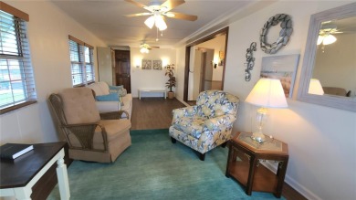 CHEERFUL HOME IN ACTIVE 55+ COMMUNITY! This one bed, two bath on River Run Golf Links in Florida - for sale on GolfHomes.com, golf home, golf lot