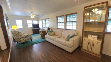 CHEERFUL HOME IN ACTIVE 55+ COMMUNITY! This one bed, two bath on River Run Golf Links in Florida - for sale on GolfHomes.com, golf home, golf lot