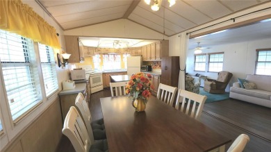 CHEERFUL HOME IN ACTIVE 55+ COMMUNITY! This one bed, two bath on River Run Golf Links in Florida - for sale on GolfHomes.com, golf home, golf lot