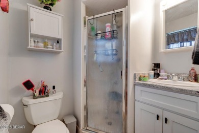 TWO BEDROOM-TWO BATH POOL HOME at an affordable price-JUST $199 on Daytona Beach Golf Club in Florida - for sale on GolfHomes.com, golf home, golf lot