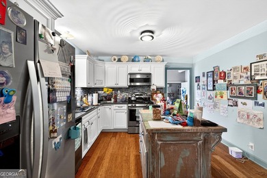 Nestled on one of the largest residential lots in the charming on College Park Municipal Golf Course in Georgia - for sale on GolfHomes.com, golf home, golf lot