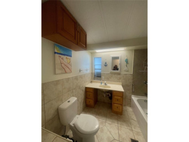 A darling, Beachside gem!  This two bedroom two bath home not on Grand Haven Golf Club in Florida - for sale on GolfHomes.com, golf home, golf lot