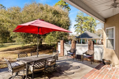 Welcome to 32 Cockadoodle Loop, a stunning estate on the River on Pawpaw Country Club in South Carolina - for sale on GolfHomes.com, golf home, golf lot