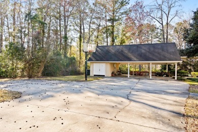 Welcome to 32 Cockadoodle Loop, a stunning estate on the River on Pawpaw Country Club in South Carolina - for sale on GolfHomes.com, golf home, golf lot