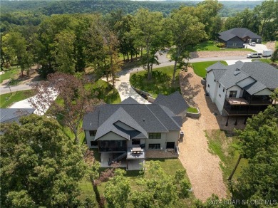 Nestled on Hole #7 of Missouri's only Arnold Palmer Signature on Osage National Golf Club in Missouri - for sale on GolfHomes.com, golf home, golf lot