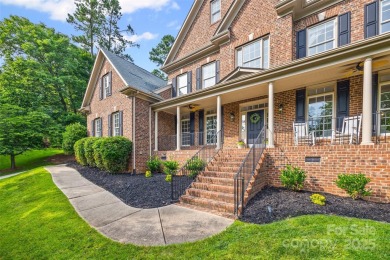 Welcome to this stately full-brick home in the heart of Tega on Tega Cay Golf Club in South Carolina - for sale on GolfHomes.com, golf home, golf lot