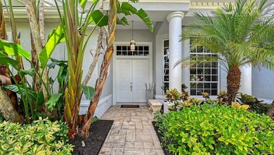 Welcome to this single-story home in the gated community of on University Park Country Club in Florida - for sale on GolfHomes.com, golf home, golf lot