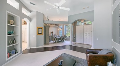 Welcome to this single-story home in the gated community of on University Park Country Club in Florida - for sale on GolfHomes.com, golf home, golf lot