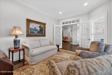 Located in the gated community of Compass Pointe in Leland, this on Compass Pointe Golf Course in North Carolina - for sale on GolfHomes.com, golf home, golf lot