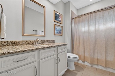 Located in the gated community of Compass Pointe in Leland, this on Compass Pointe Golf Course in North Carolina - for sale on GolfHomes.com, golf home, golf lot