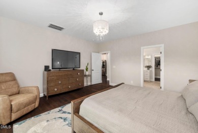 Step into the epitome of luxury with this stunning 6-bedroom on The Preserve At Jordan Lake Golf Club in North Carolina - for sale on GolfHomes.com, golf home, golf lot