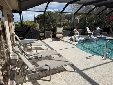 CUSTOM-BUILT POOL HOME OVERLOOKING THE 11TH HOLE IN SOUGHT-AFTER on St. Lucie Trail Golf Club in Florida - for sale on GolfHomes.com, golf home, golf lot