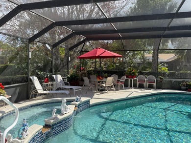 CUSTOM-BUILT POOL HOME OVERLOOKING THE 11TH HOLE IN SOUGHT-AFTER on St. Lucie Trail Golf Club in Florida - for sale on GolfHomes.com, golf home, golf lot