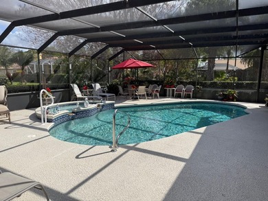 CUSTOM-BUILT POOL HOME OVERLOOKING THE 11TH HOLE IN SOUGHT-AFTER on St. Lucie Trail Golf Club in Florida - for sale on GolfHomes.com, golf home, golf lot