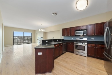 Enjoy upscale living at The Residences of Seven Bridges. This on Seven Bridges Golf Club in Illinois - for sale on GolfHomes.com, golf home, golf lot