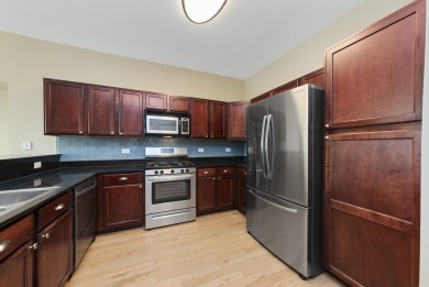 Enjoy upscale living at The Residences of Seven Bridges. This on Seven Bridges Golf Club in Illinois - for sale on GolfHomes.com, golf home, golf lot