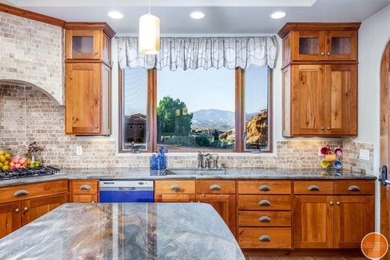 Stunning custom home on 1.10 acres in the gated community of on St. George Golf Course in Utah - for sale on GolfHomes.com, golf home, golf lot