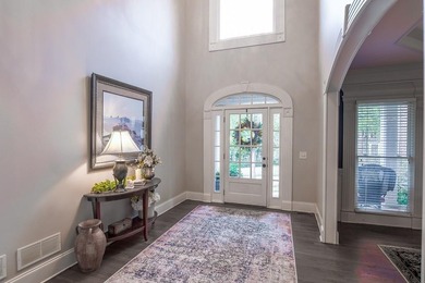 Experience refined living at 1041 Windermere Crossing an elegant on Windermere Golf Club in Georgia - for sale on GolfHomes.com, golf home, golf lot