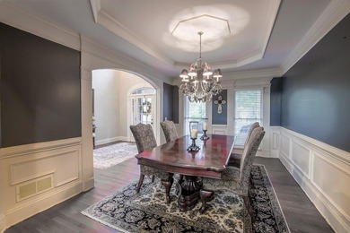 Experience refined living at 1041 Windermere Crossing an elegant on Windermere Golf Club in Georgia - for sale on GolfHomes.com, golf home, golf lot