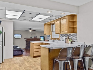 Welcome to this 3-bedroom, 2-bath ranch located on Oak Ridge on Oak Ridge Golf Course in Wisconsin - for sale on GolfHomes.com, golf home, golf lot