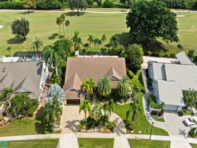 Exceptional home in Boca Woods Country Club combines luxury and on Boca Woods Country Club in Florida - for sale on GolfHomes.com, golf home, golf lot