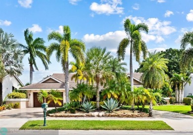 Exceptional home in Boca Woods Country Club combines luxury and on Boca Woods Country Club in Florida - for sale on GolfHomes.com, golf home, golf lot